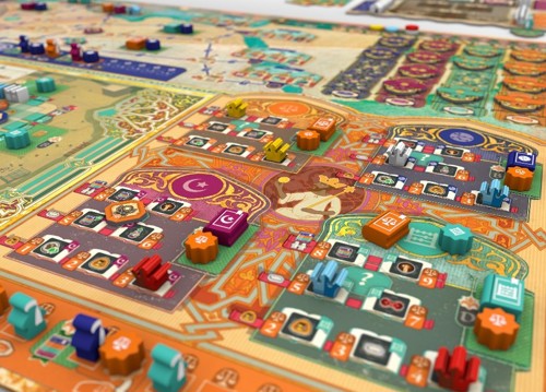 A close-up of the law area on the final board, fully illustrated in vibrant colour and with various wooden and cardboard tokens placed around it