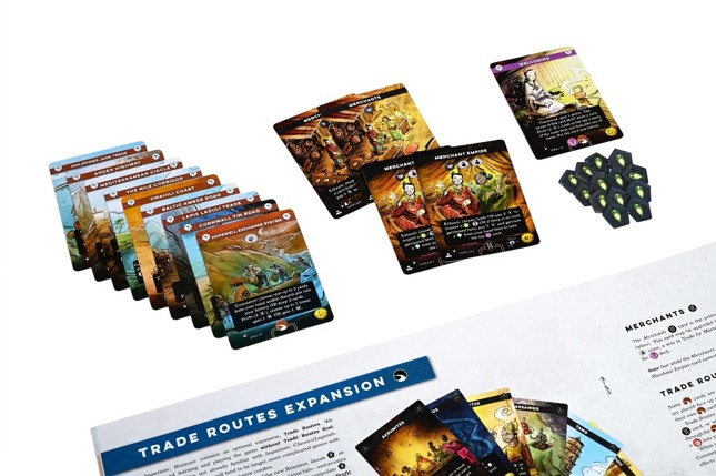 An image of final cards and tokens from Imperium: Horizons' trade module laid out above the relevant page of the rulebook