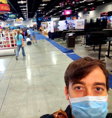 A selfie of a member of the Osprey Games team at Gen Con 2022
