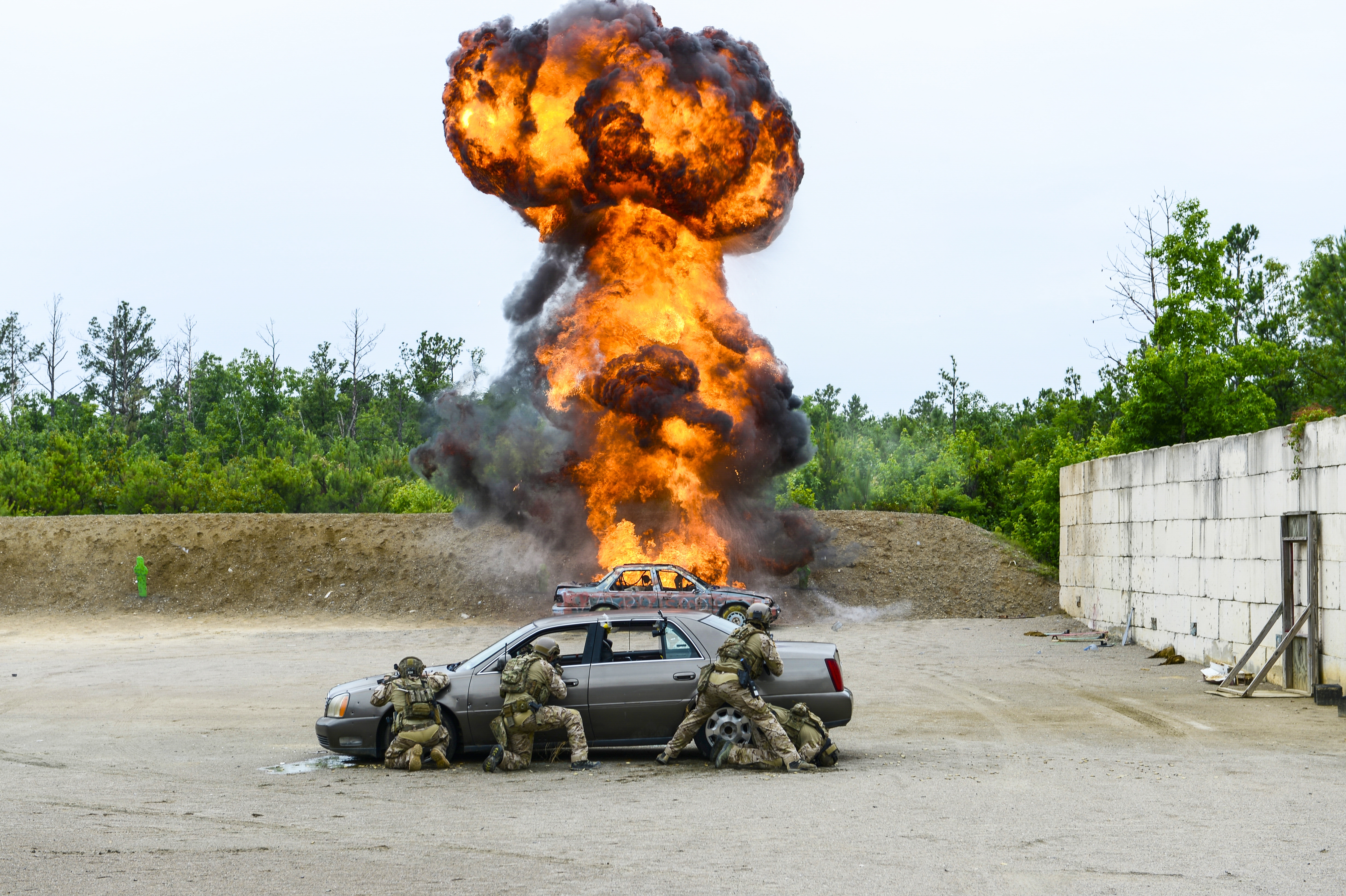 Army special operators engage an enemy vehicle 