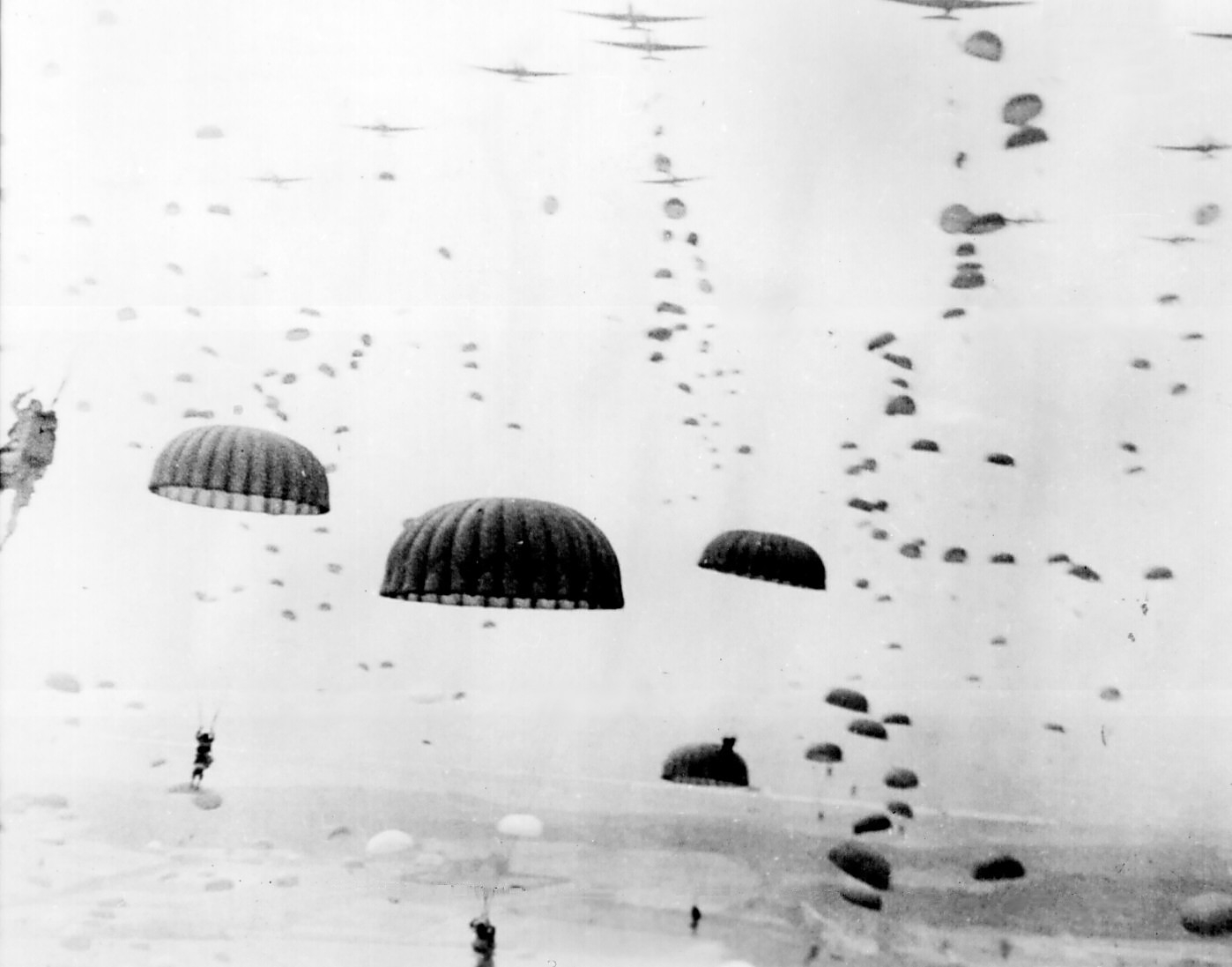101st Airborne inspecting broken glider in Holland