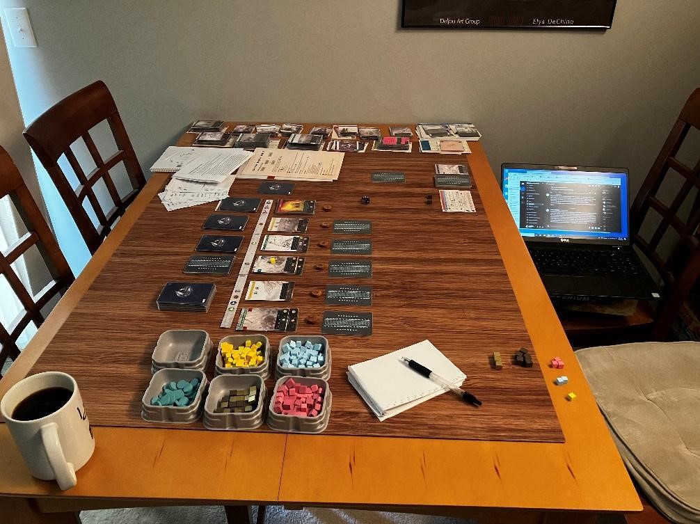 Photo of a table arranged with all the components of an Imperium: Horizons prototype