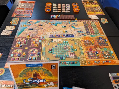 A photo of a final copy of Sankoré, fully set up for a game on a table